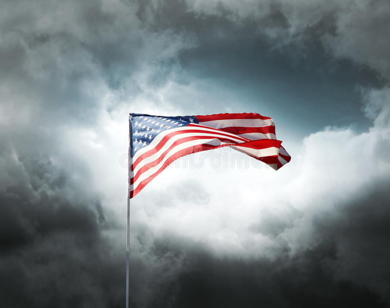 american-flag-cloudy-dramatic-sky-15156433.jpg