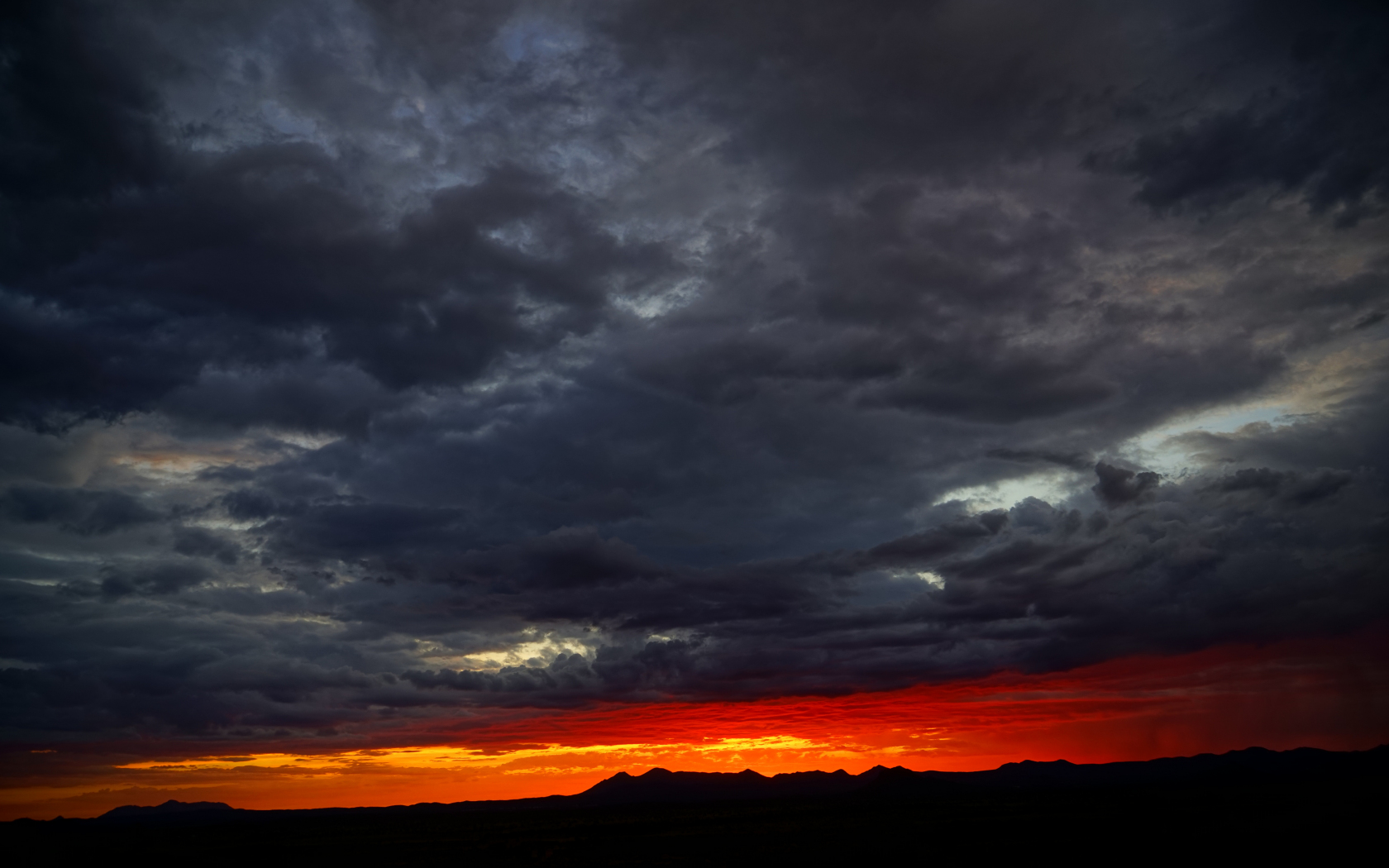 dark-clouds-sunset.jpg