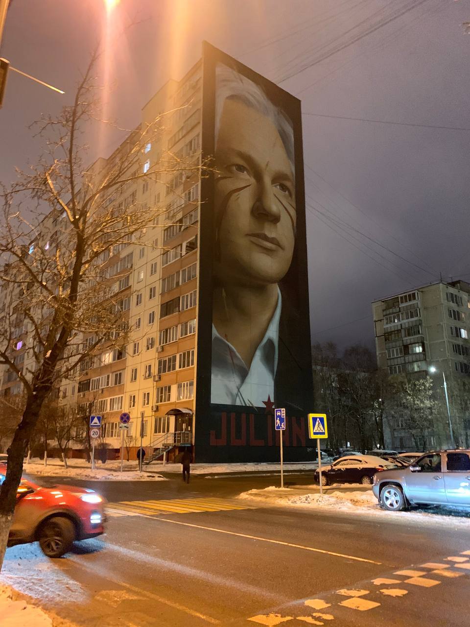 Julian Assange - Here is a mural on an ordinary house in a residential area on Novaya Street i...jpg