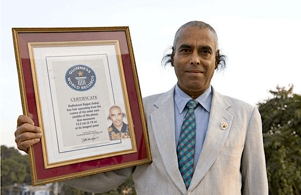 Radhakant Bajpai has the world record for longest ear hair, measuring 11 inches.png