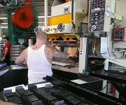 Folsom License plate factory Press 1.jpg