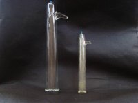 Our 1oz tube next to our 10 gram tube.